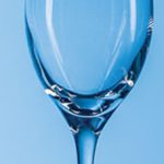engraved-champagne-glasses-stl42-displayed-on-a-pale-blue-background